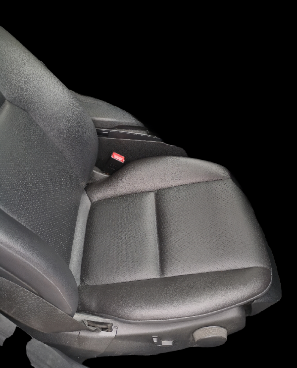 Black leather car seat with adjustable controls.