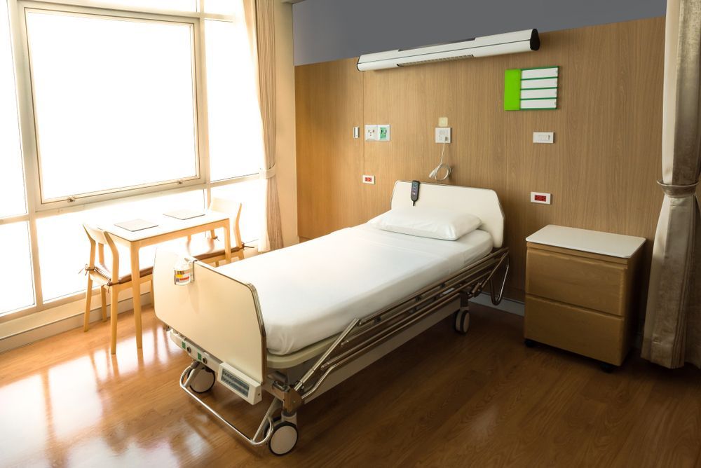 Hospital Room With Bed, Window, Table, and Bedside Cabinet — Ballina Home Healthcare Sales & Hire and Compression Stockings Plus in Ballina, NSW