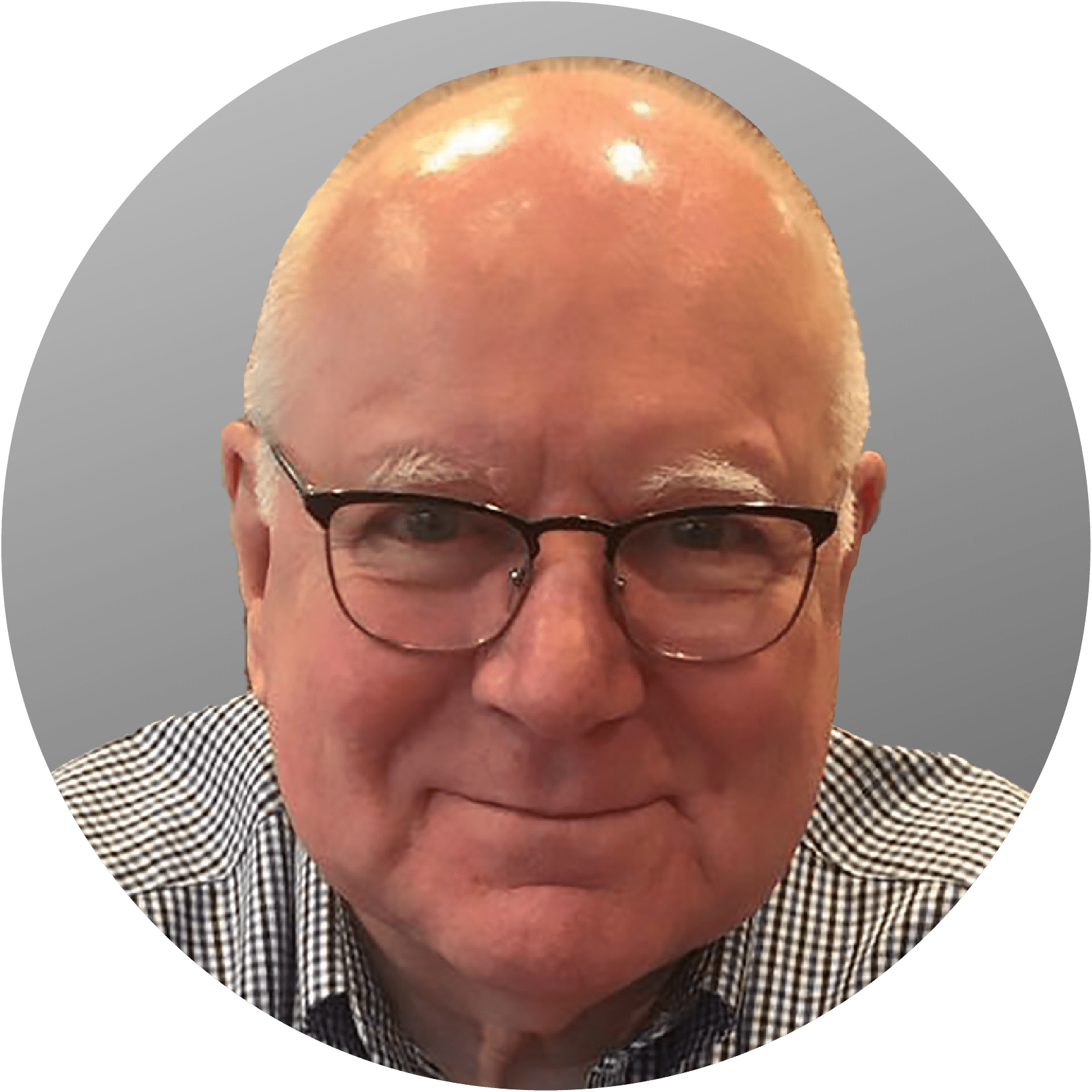 Older, bald man with glasses smiling, wearing a checkered shirt, inside a gray circle.