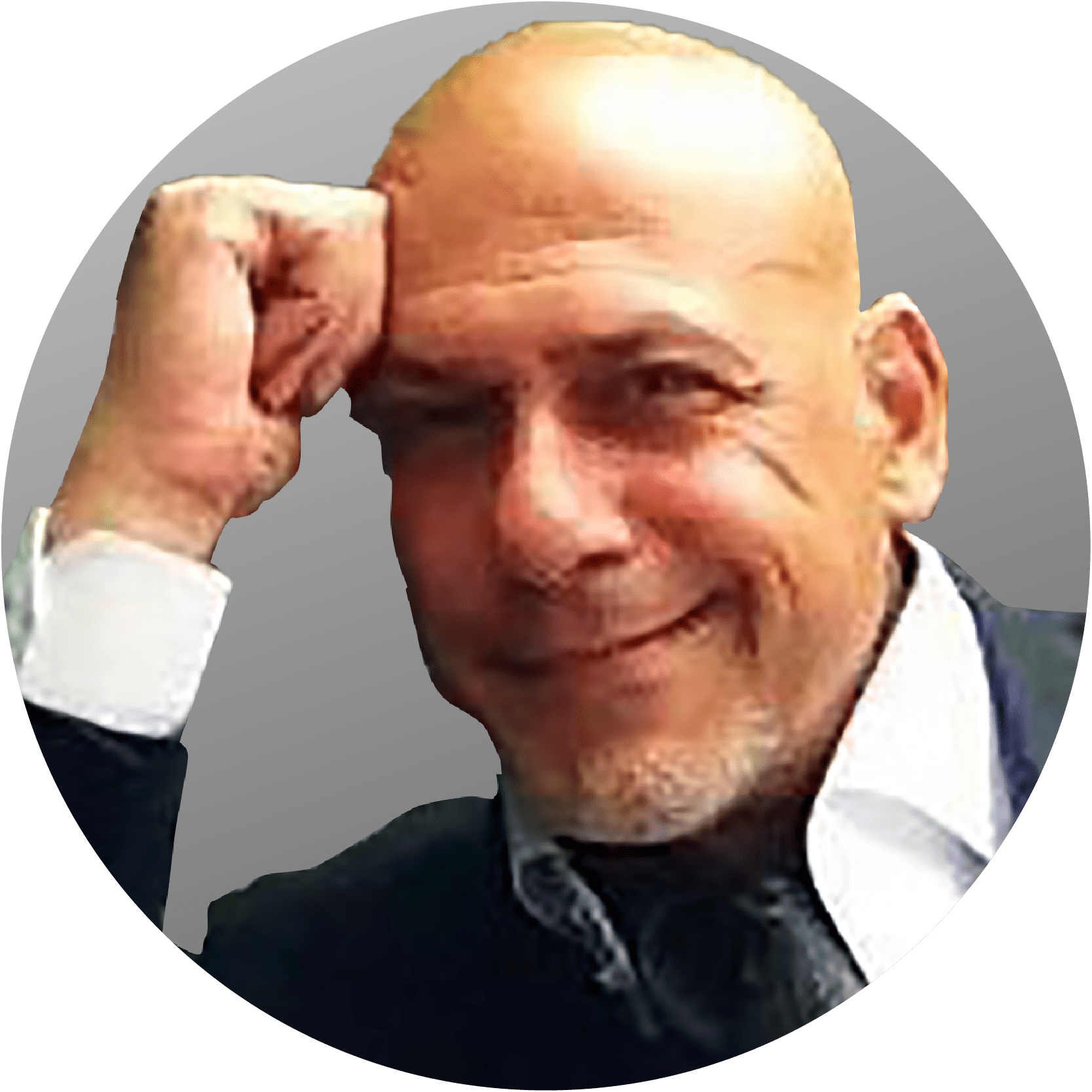 Bald man with hand on forehead, smiling slightly; wearing a suit jacket and collared shirt.