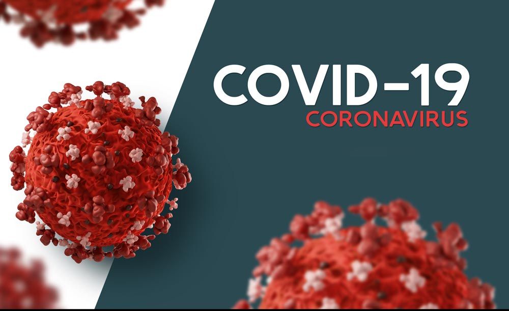 A close up of a covid-19 coronavirus on a blue and white background.