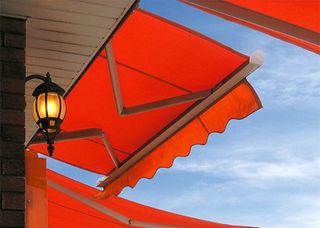 Quality Awning — Orange Colored Awning  in Palm Beach, FL