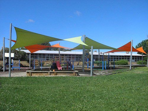 Home Awning Installations — Colorful Awning On the Park in Palm Beach, FL