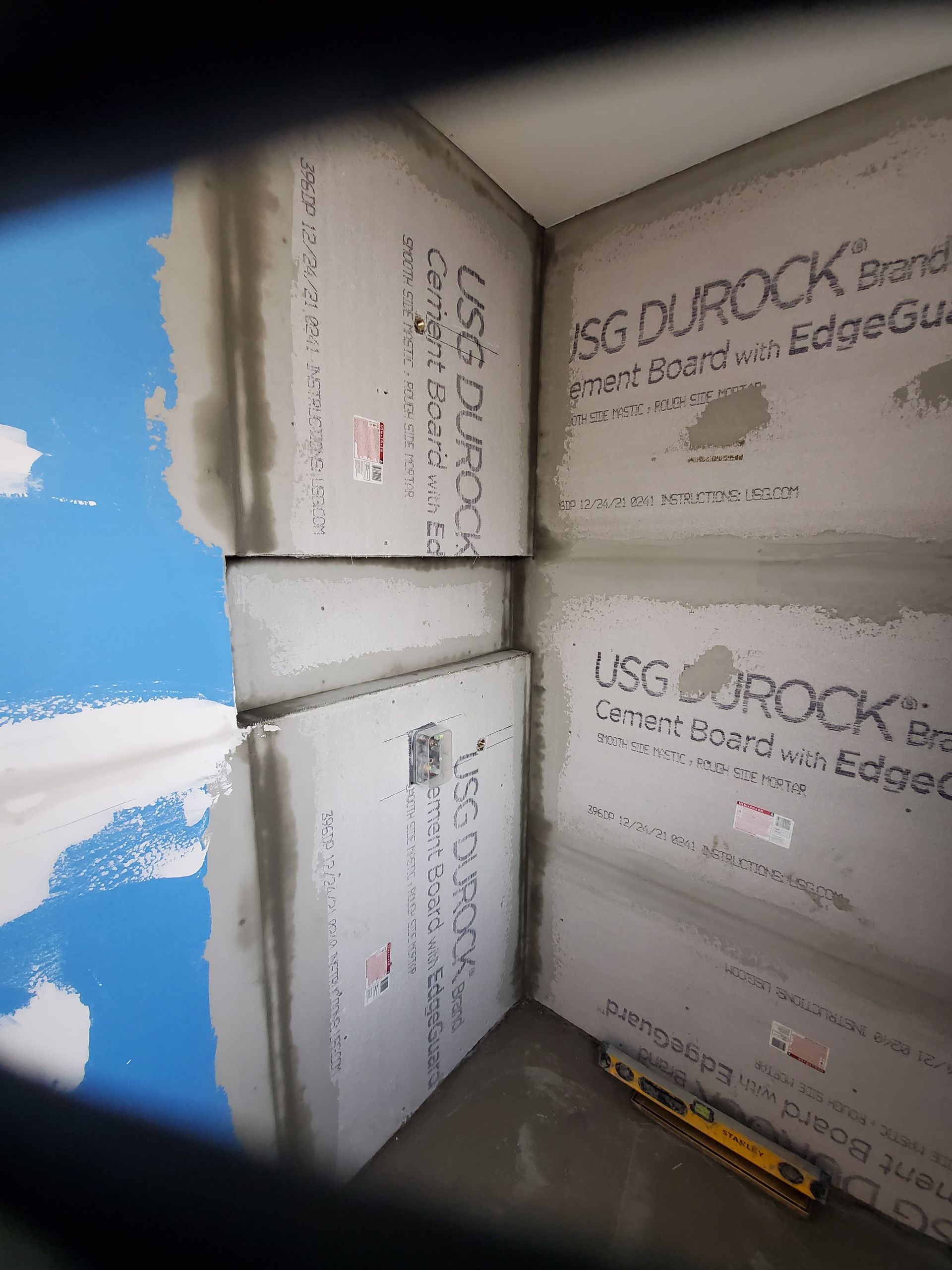 A stack of uss durock foam blocks on a wall