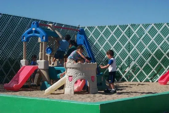 Kids Playing at the Playground — El Paso, TX — Sunshine Day Care Center