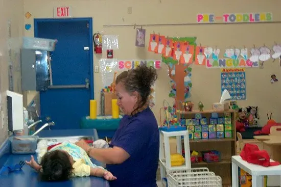 Teacher and Infant — El Paso, TX — Sunshine Day Care Center