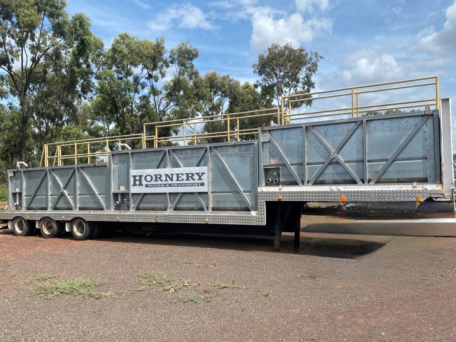 a large trailer with hornery written on it