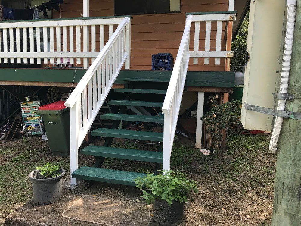 New Wooden Staircase With Handles And New Paint — Property Maintenance & Garden Care in Beerwah, QLD