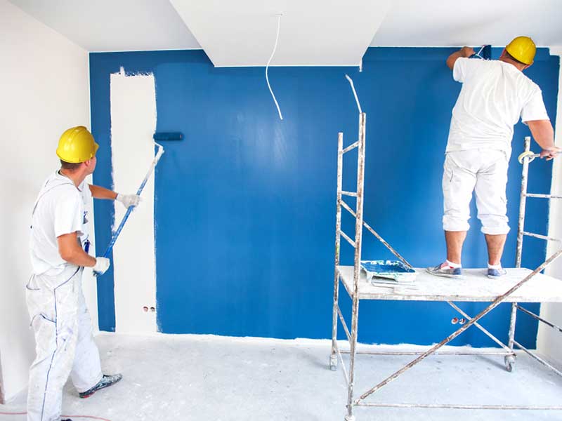 Two Man Painting A Wall — Property Maintenance & Garden Care in Beerwah, QLD