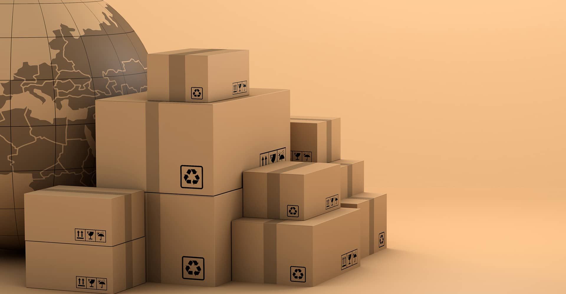 A pile of cardboard boxes stacked on top of each other in front of a globe.