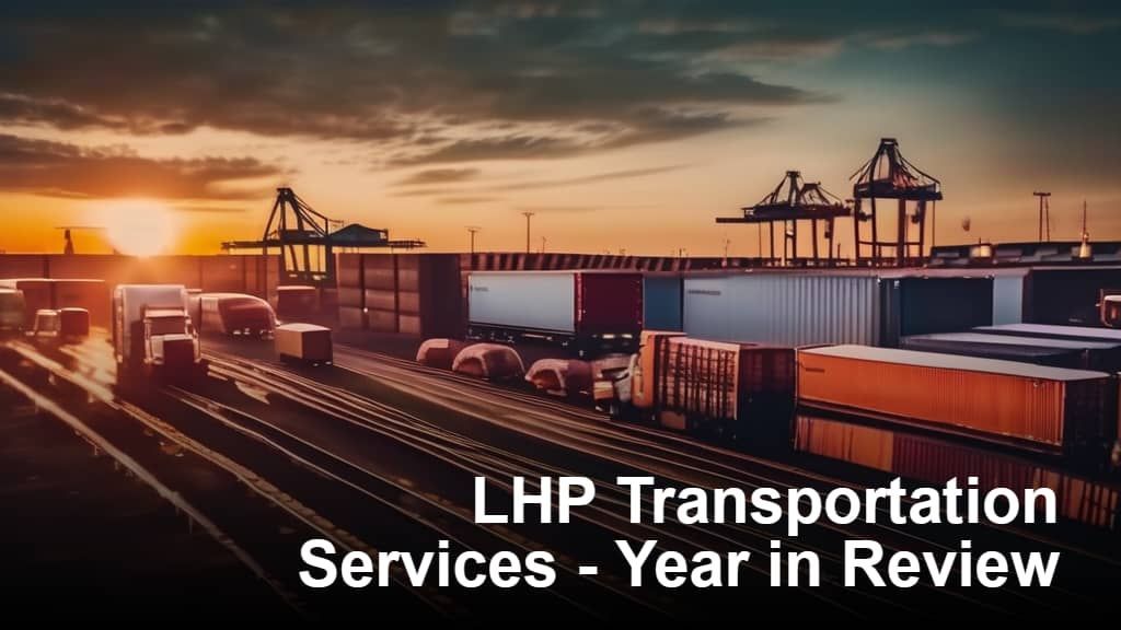 A sunset over a train yard with the words lhp transportation services year in review