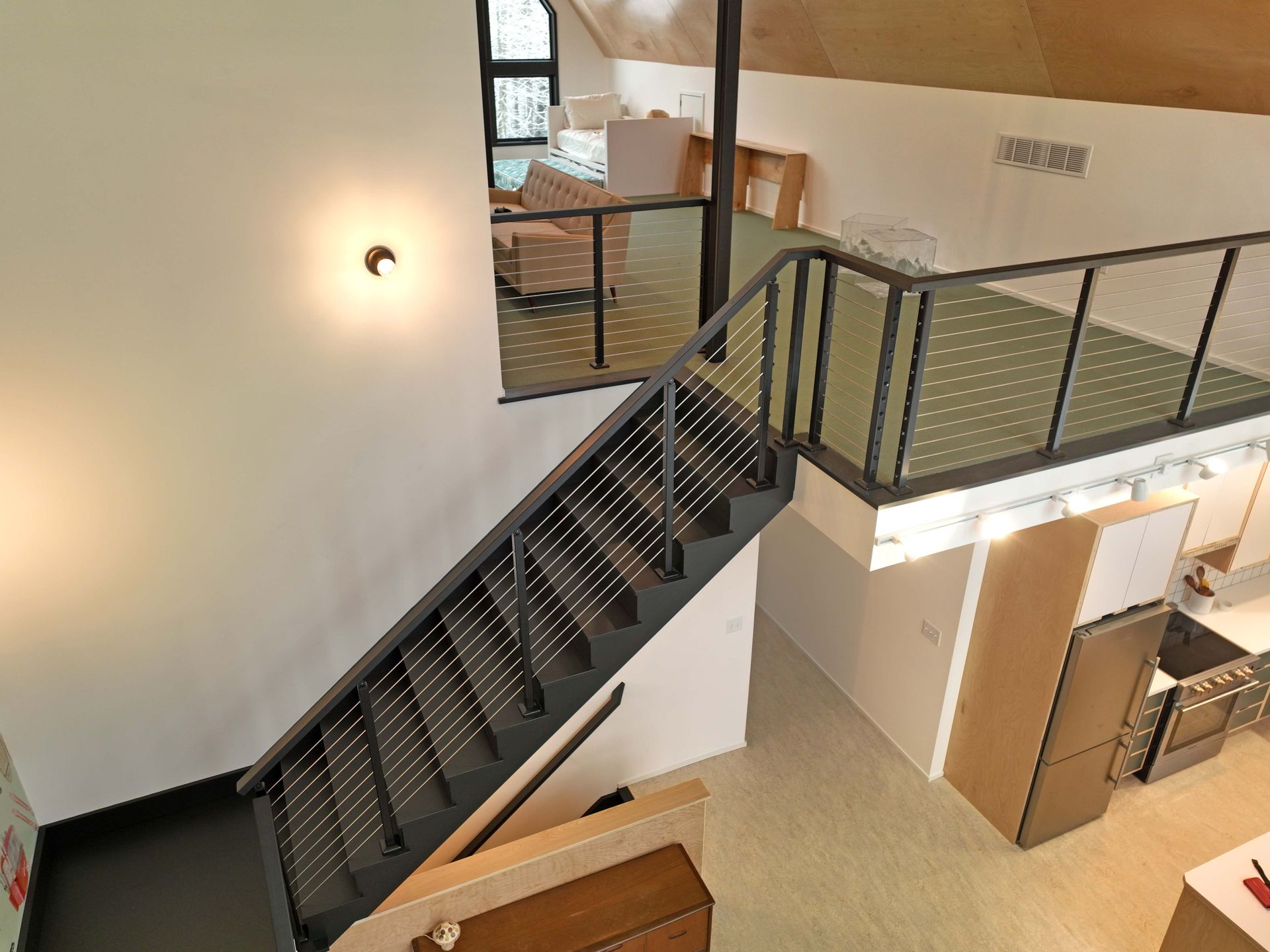 A staircase leading up to the second floor of a house