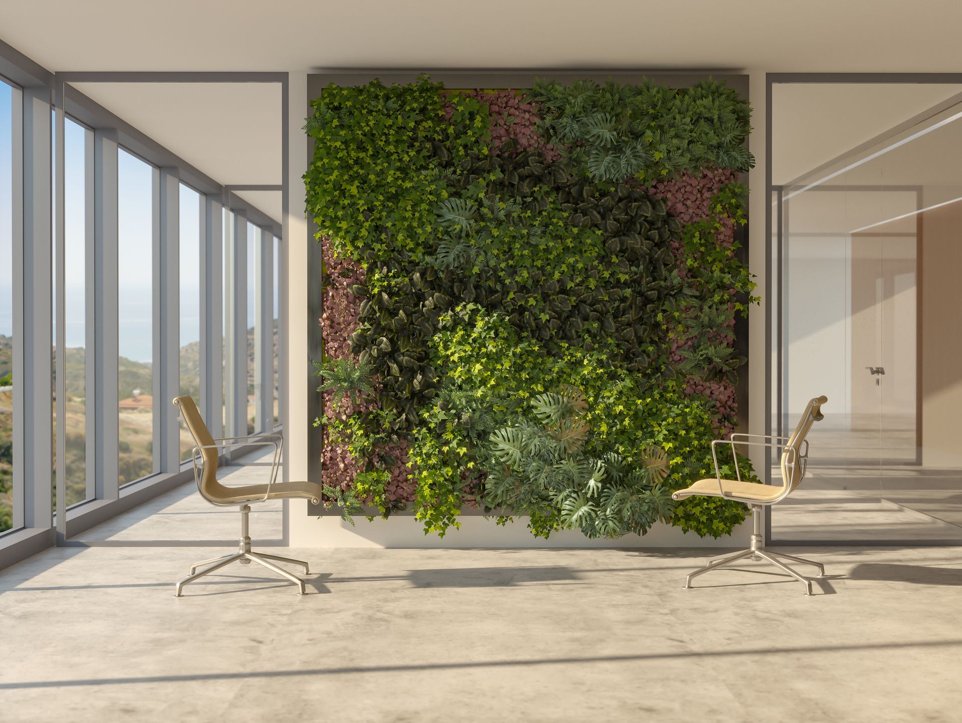 A living wall in an office with two chairs in front of it.