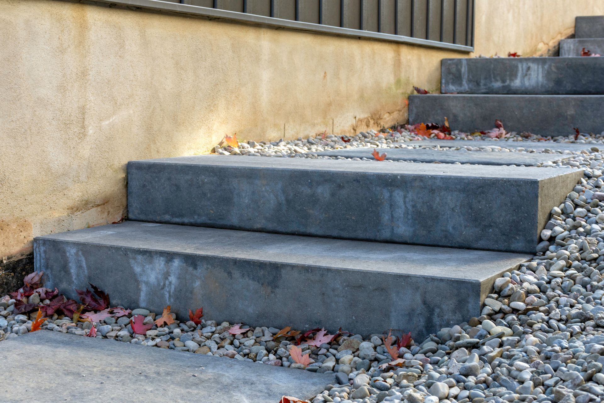 A set of concrete steps leading up to a building