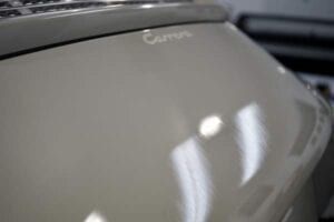 A close up of the back of a white car.