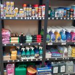 A shelf full of cleaning products including good year