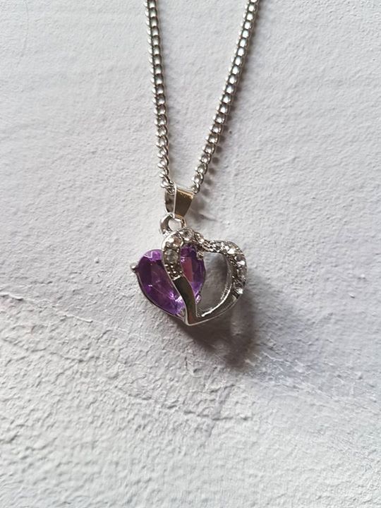 amethyst heart with silver heart and stones