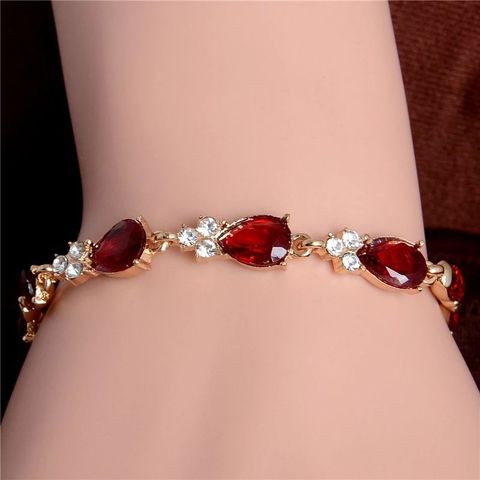 ruby colour stone bracelet