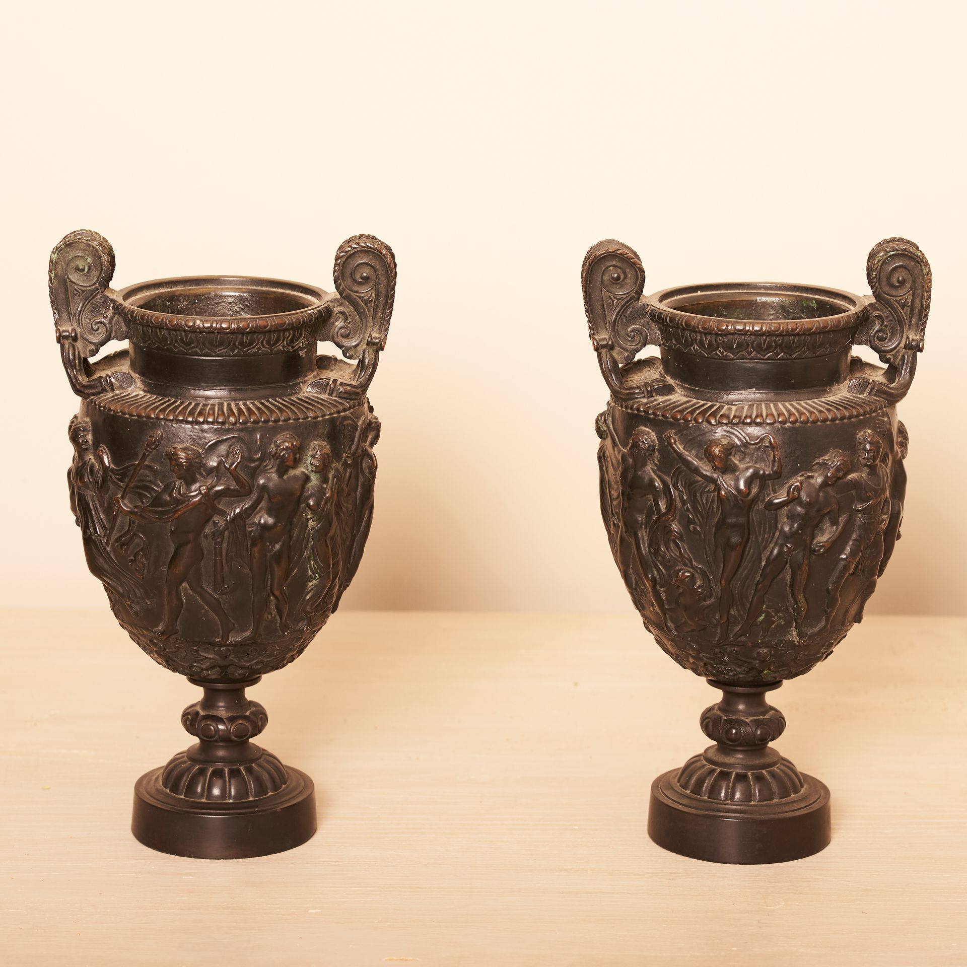 2 Bronze vases with elaborate castings of Roman scenes.