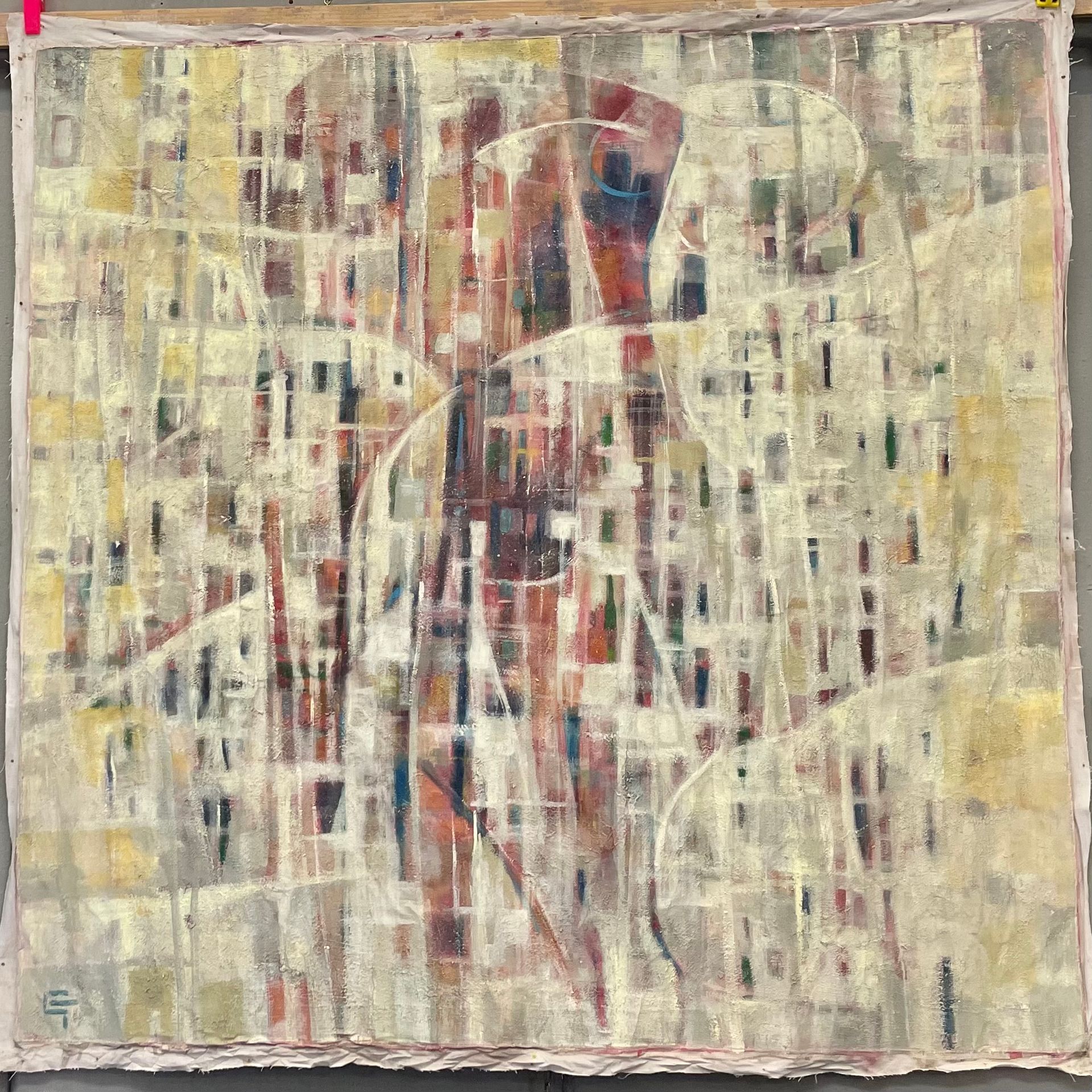 An abstract painting with dynamic paint movement above a loose grid of paint in various colours.