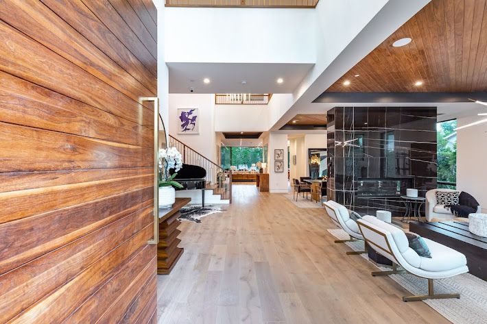A kitchen with a large island in the middle of the room.