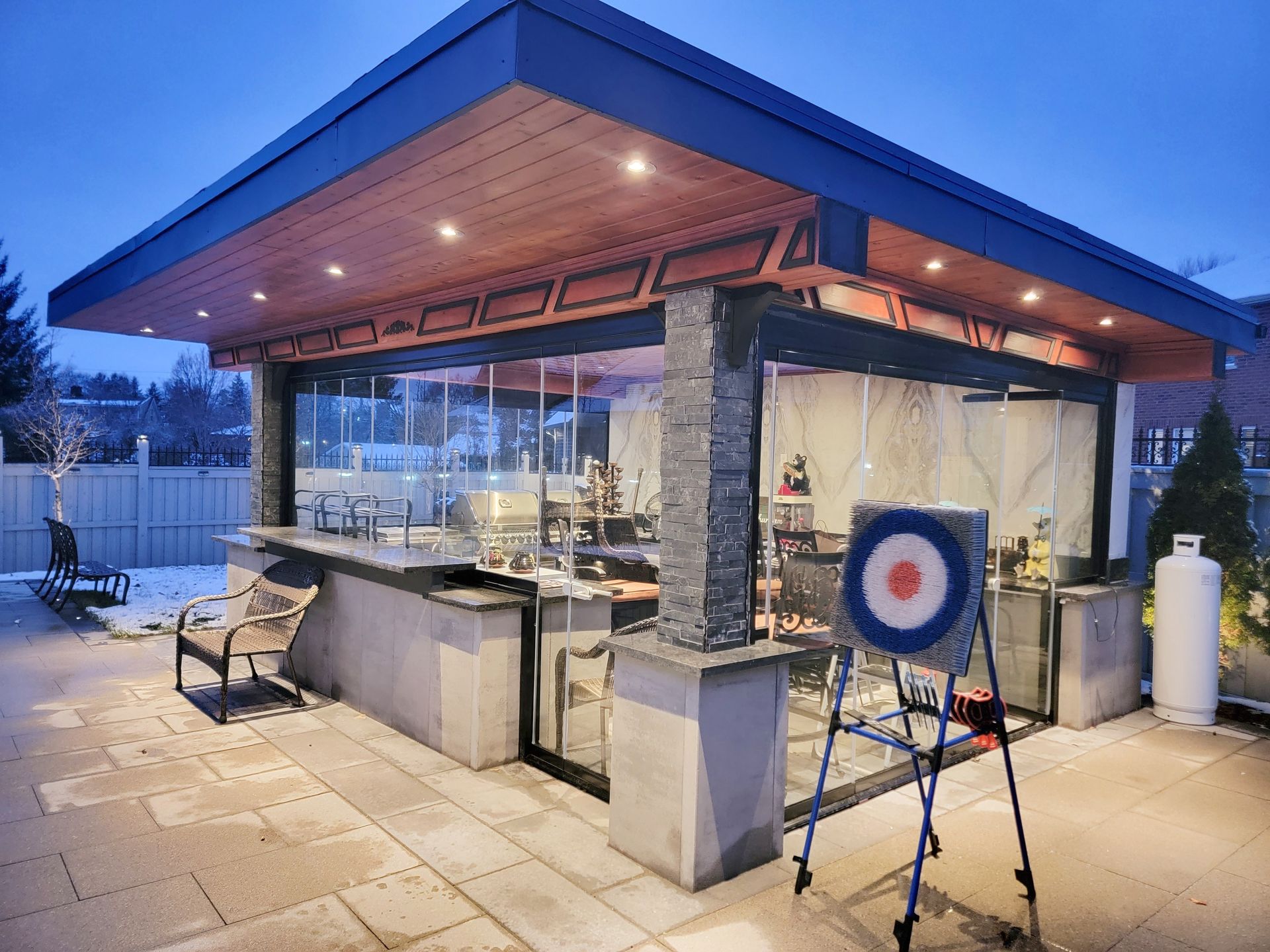 A large building with a bar and a target in front of it.