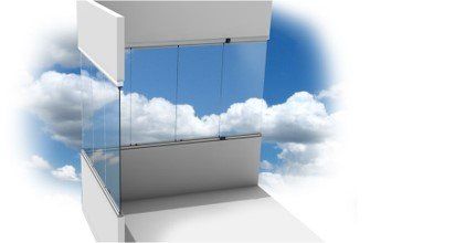 A building with a lot of windows and a blue sky in the background.