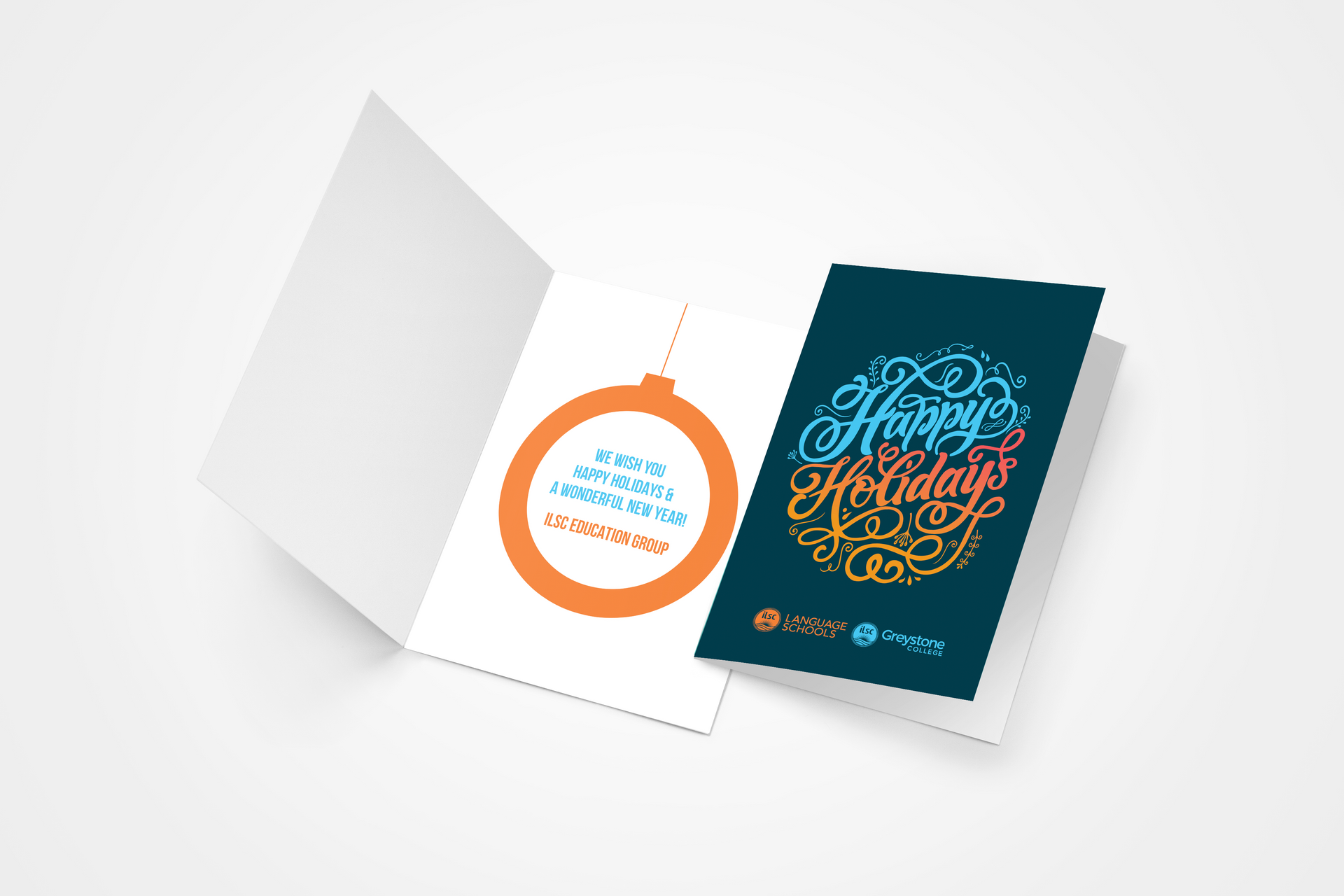 Opened greeting card with orange and teal birthday design on a white background