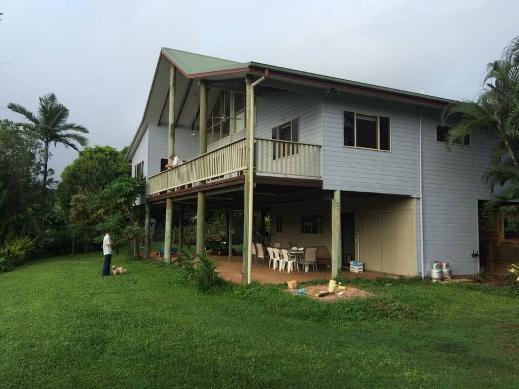 A Large House With A Large Lawn In Front Of It — Pete's Painting Solutions In Kewarra Beach, QLD