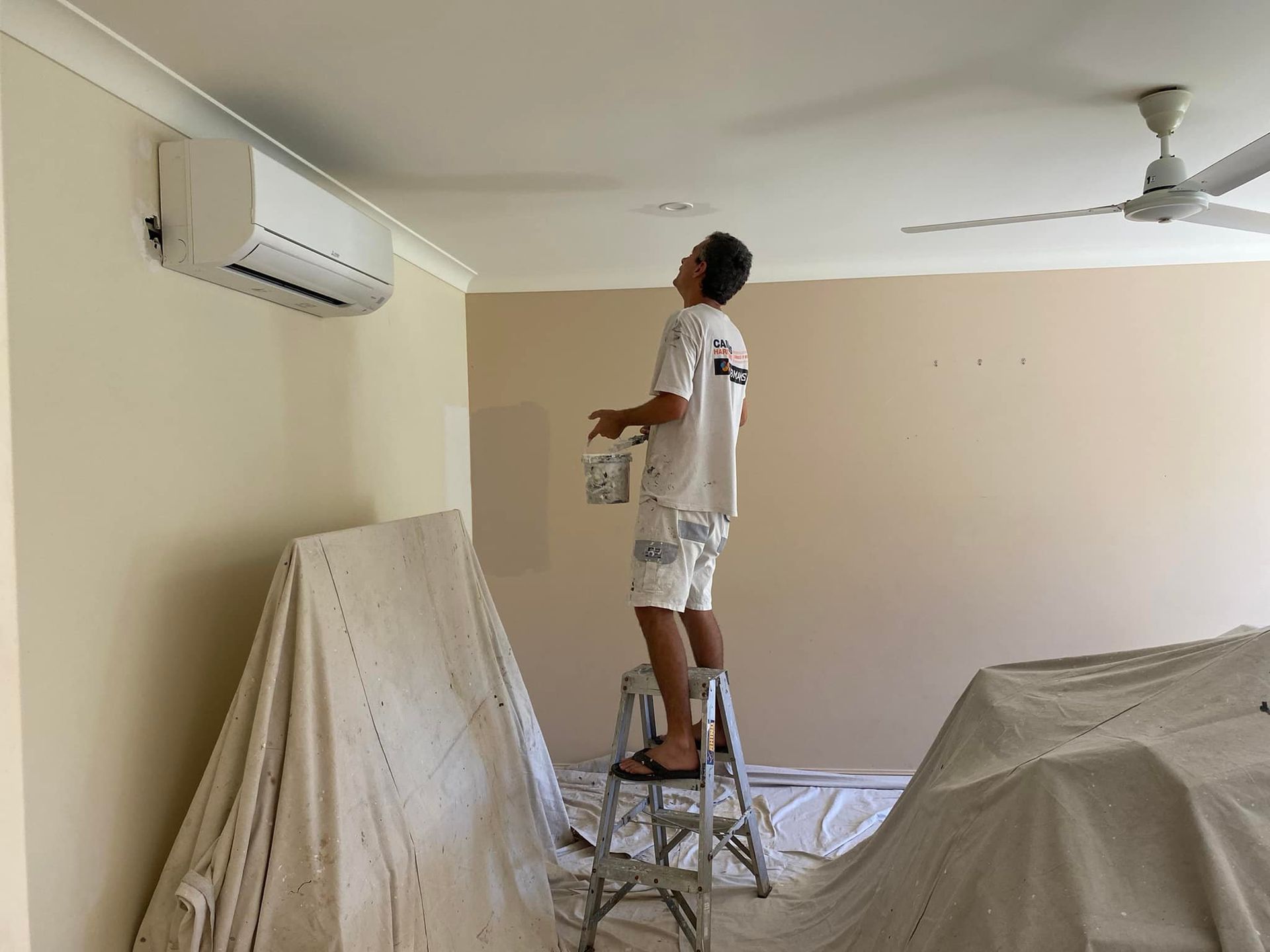 A Man Preparing The Home Before Painting