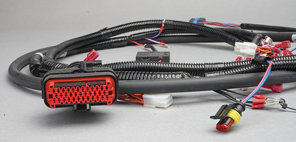 Mobile vehicle wire harnesses, cable harnesses and electrical enclosure assemblies. 1