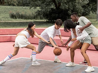 under 18's playing on a basketball court