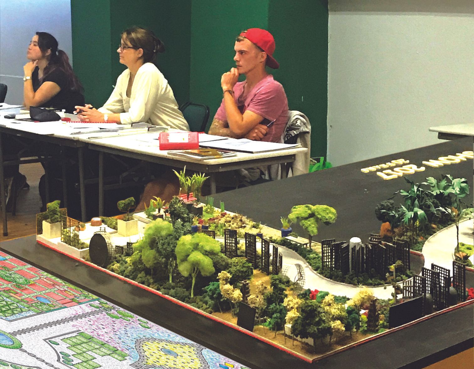 students in classroom with landscape design model in the forefront
