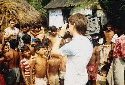 Bryan Boorujy taking pictures ofchildren