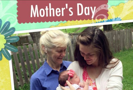 Two women holding a baby in front of a sign that says mother 's day