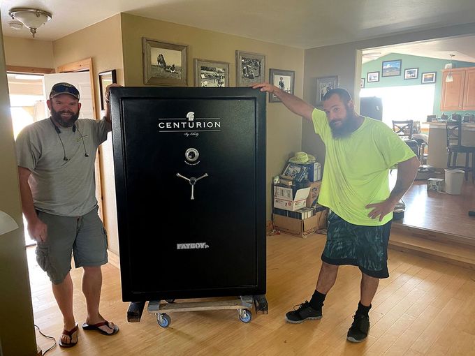 Two Men Holding the Vault — Belgrade, MT — Rock Steady Movers