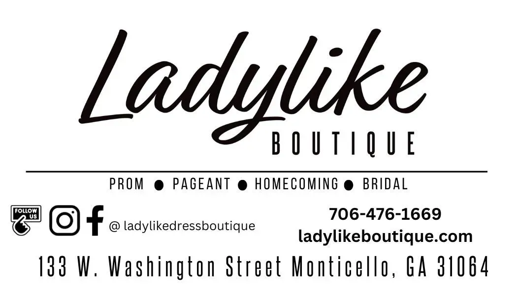 A logo for a boutique called ladylike boutique