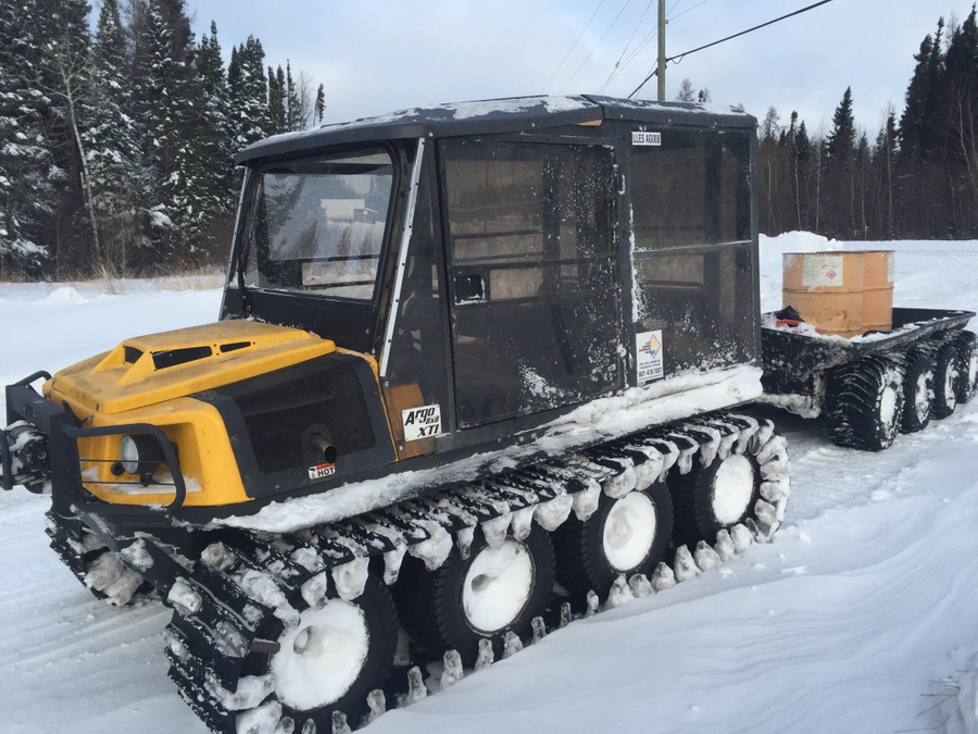 Argo 8x8 XTI on the move on a winter road.