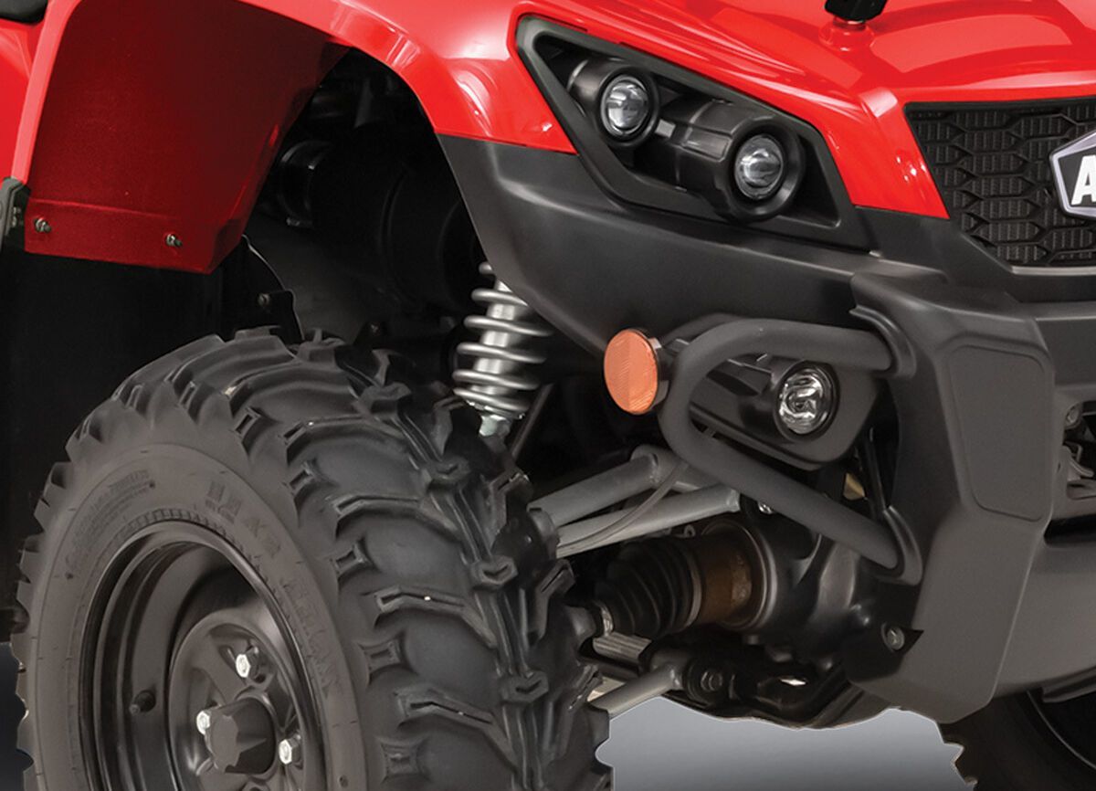 A shock on a red ATV.
