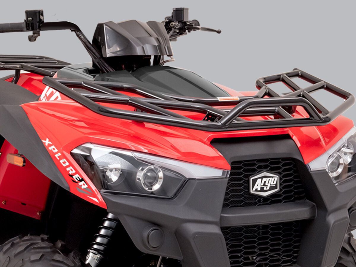 Black steel racks on the front of a red ATV.