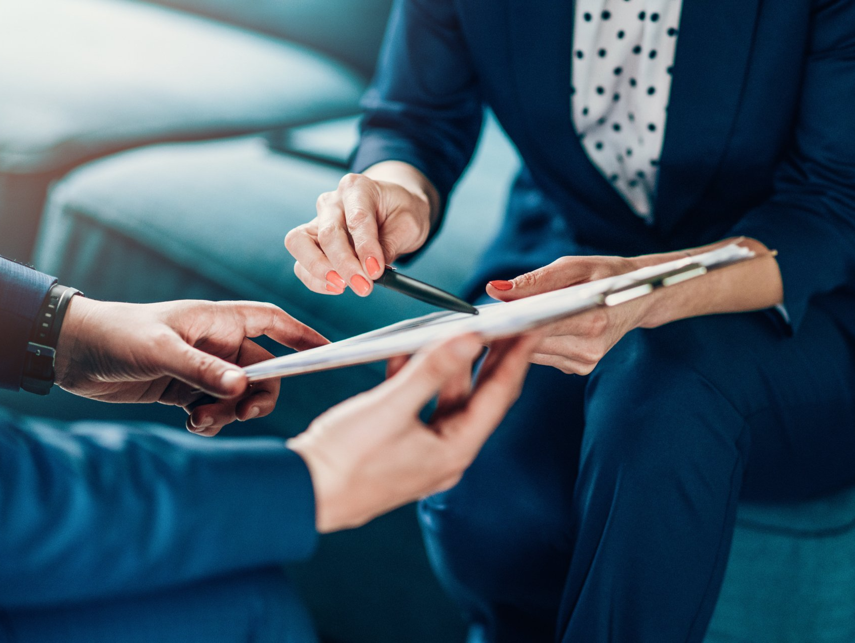 businesspeople looking at document