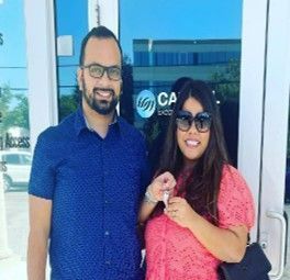 couple who just closed on their new home with the sell south florida team