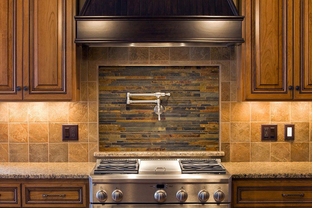 Elegant Stone Design On Pot Faucet — La Habra, CA — Ace Kitchen & Bath Remodeling