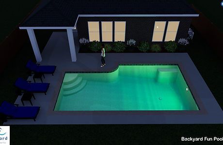 An aerial view of a backyard fun pool at night