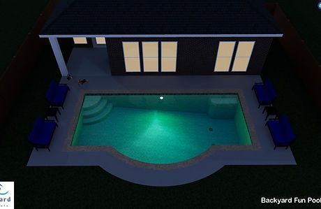 An aerial view of a backyard fun pool at night