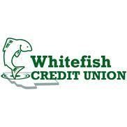 The whitefish credit union logo is a fish jumping out of the water.