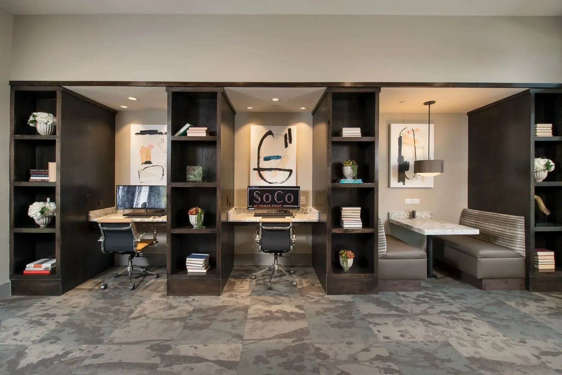 Modern workspace with desks and seating in a shared area