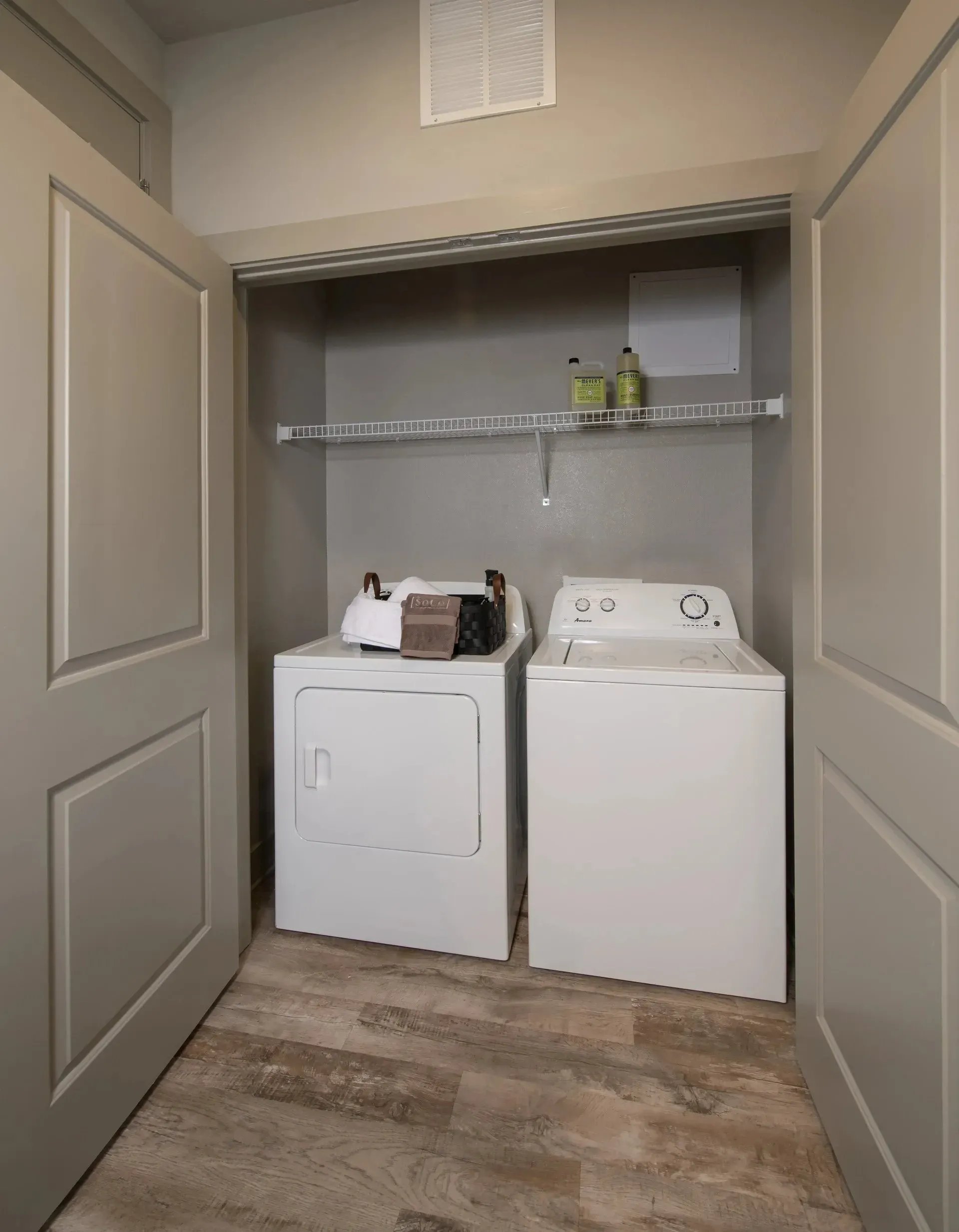 Laundry area with a washing machine and dryer in a closet