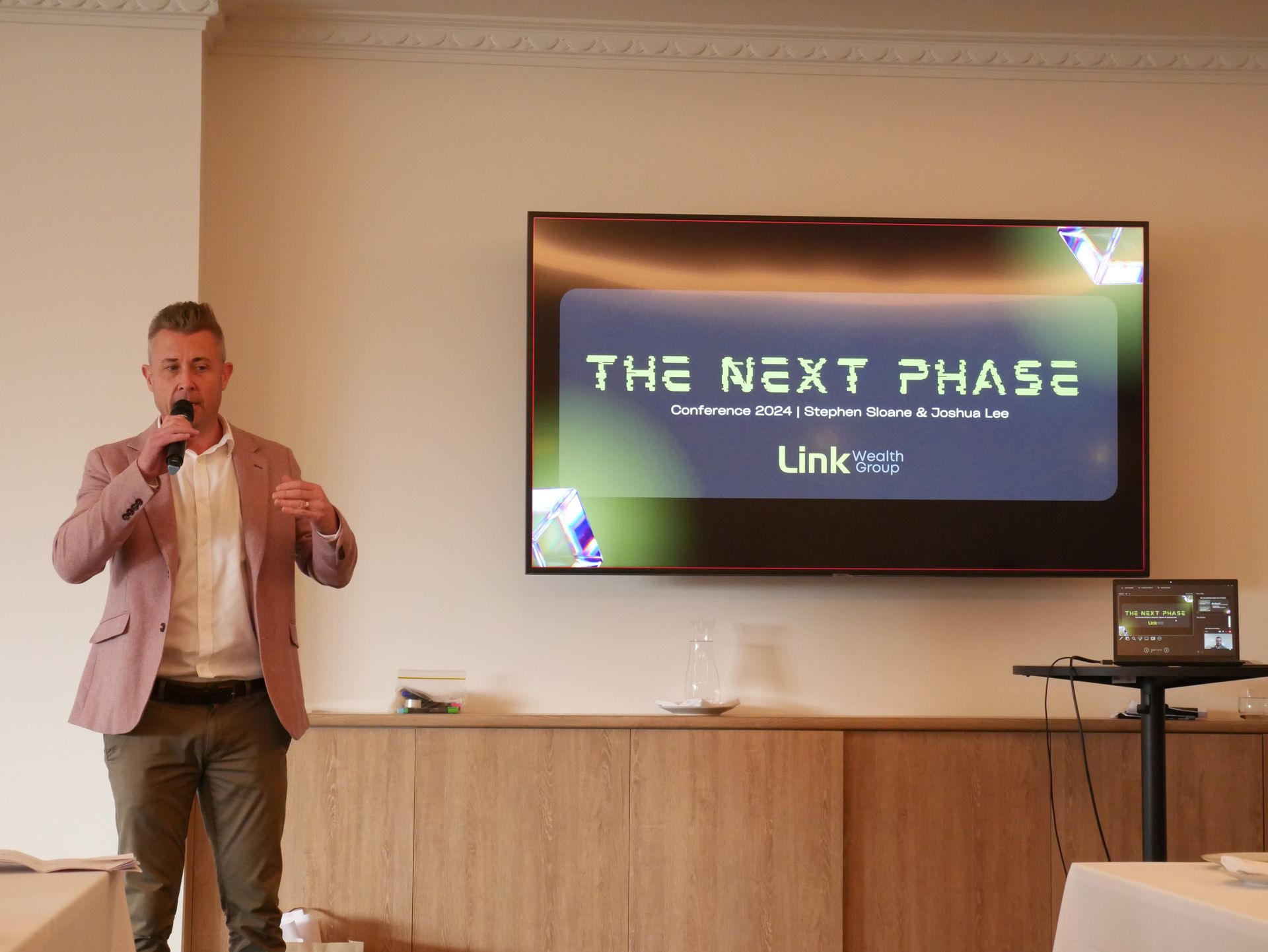 Man giving a presentation with title 