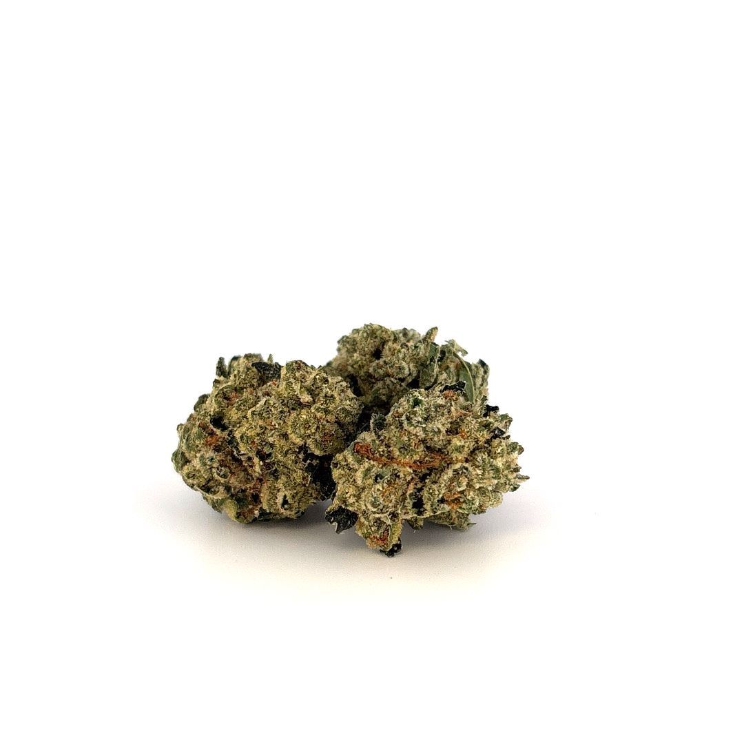 Three green and tan cannabis buds on a white background.